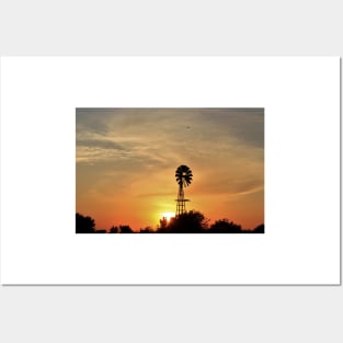 Kansas colorful Sunset with a Windmill silhouette and a bird in the sky. Posters and Art